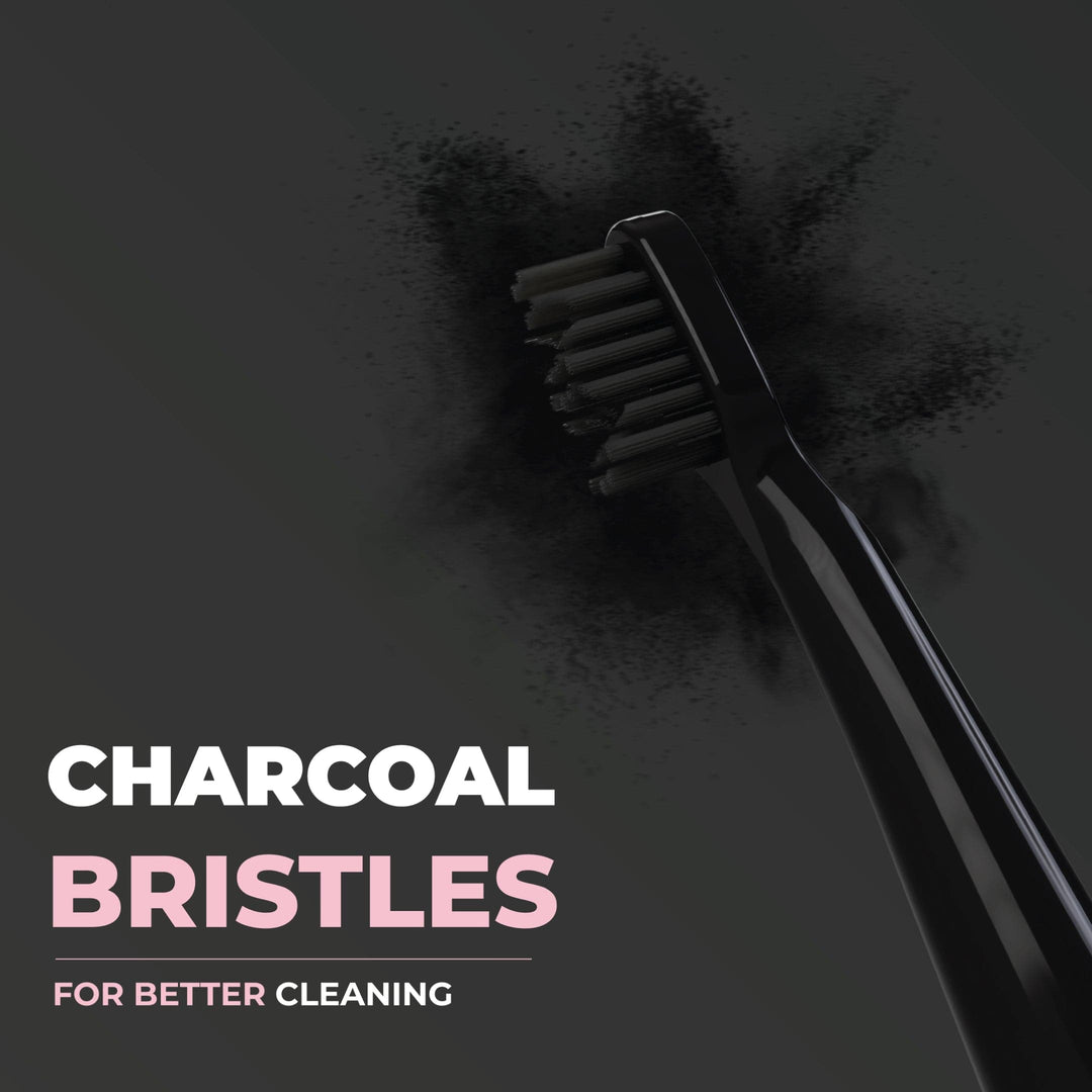 Hammer brush heads with charcoal bristles
